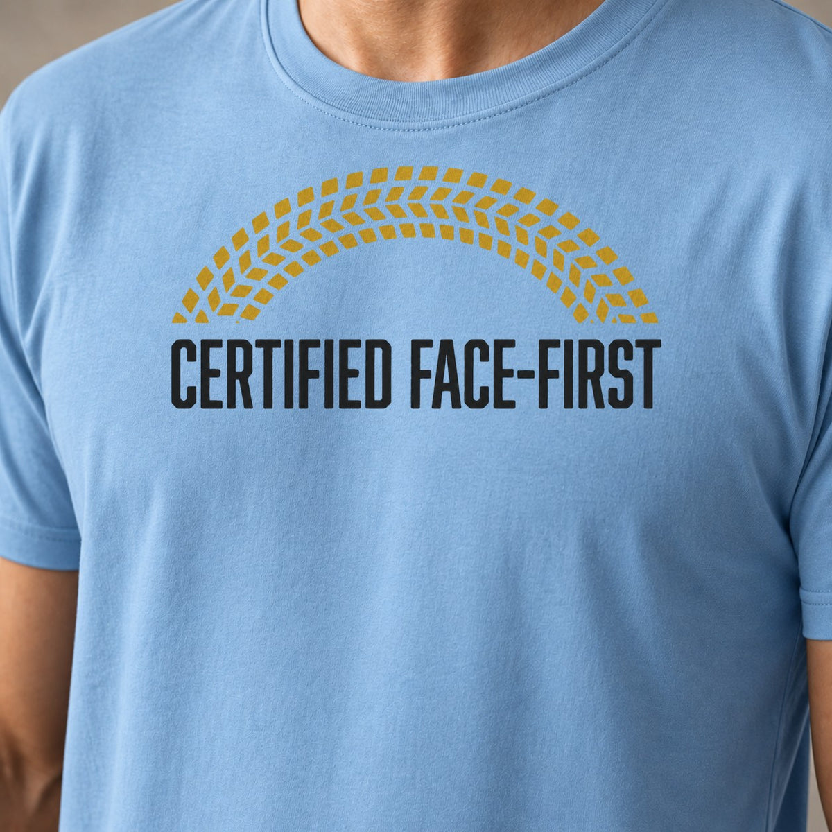 Certified face first funny mountain bike t-shirt in Light Blue — close-up of the print