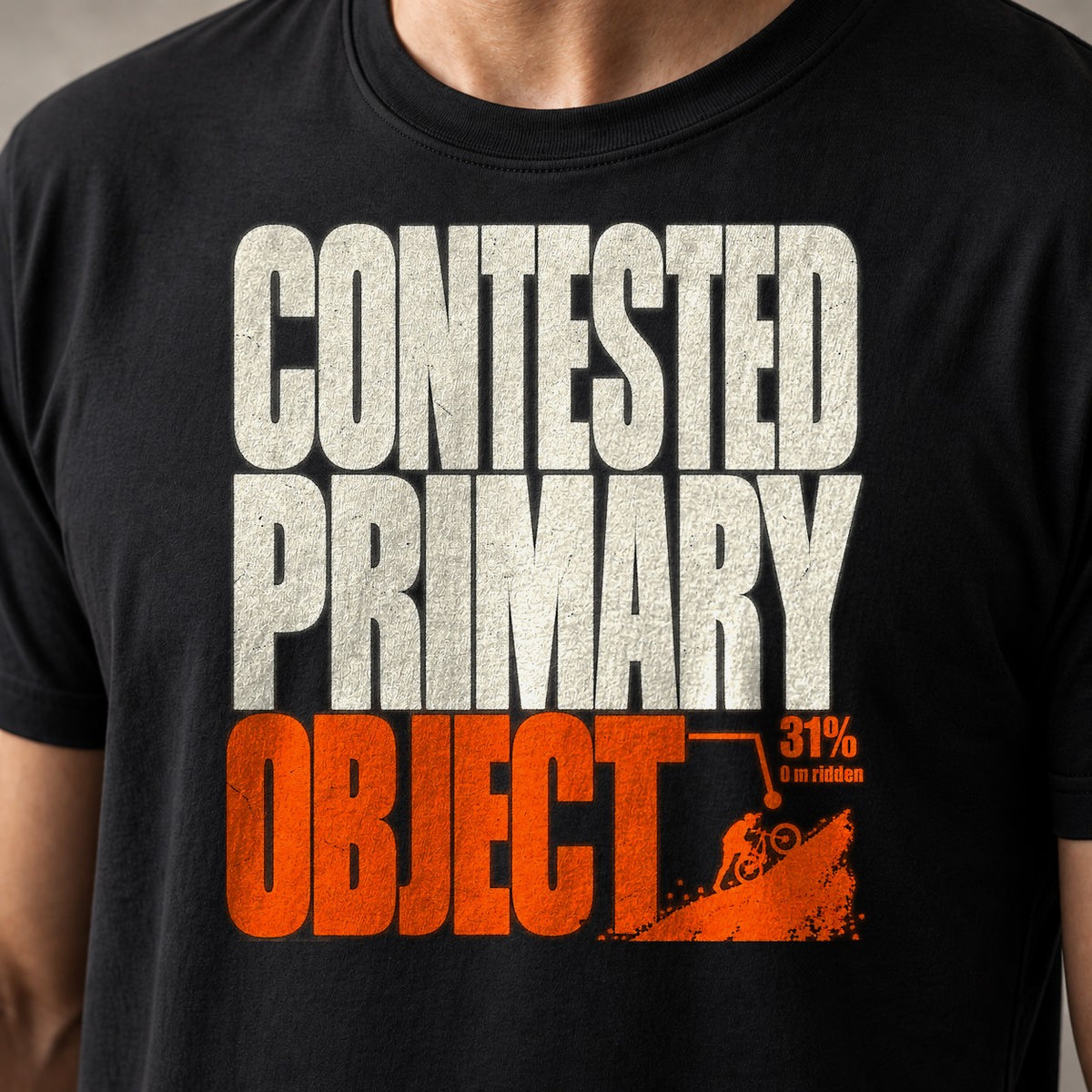 Contested Primary Object funny mountain bike t-shirt in Black — stacked lettering with a rider grinding up a 31% pitch — close-up of the print