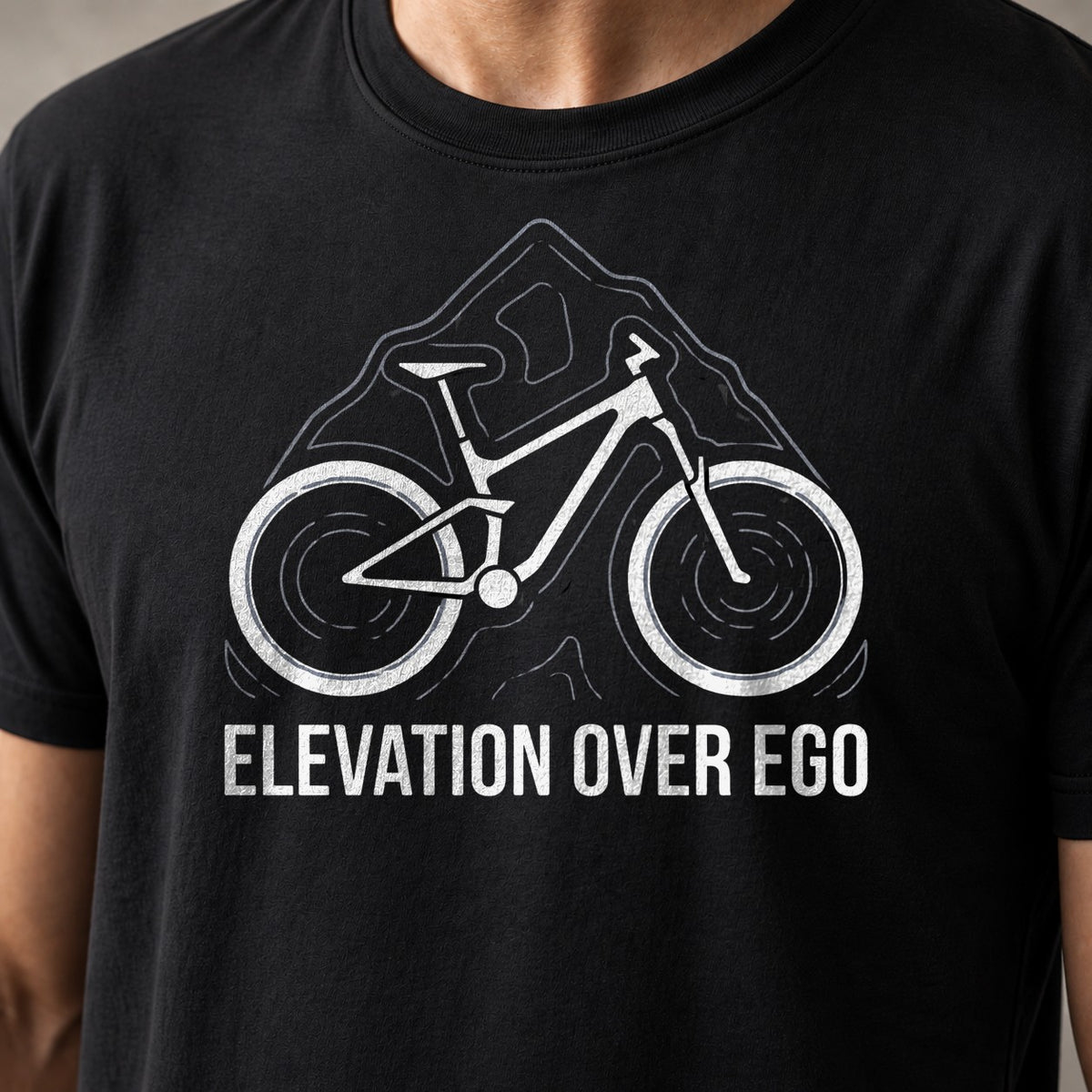 Elevation Over Ego funny mountain bike t-shirt in Black — close-up of the print