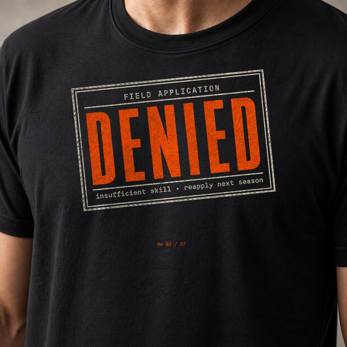 Field app Denied funny mountain bike t-shirt in Black — close-up of the print