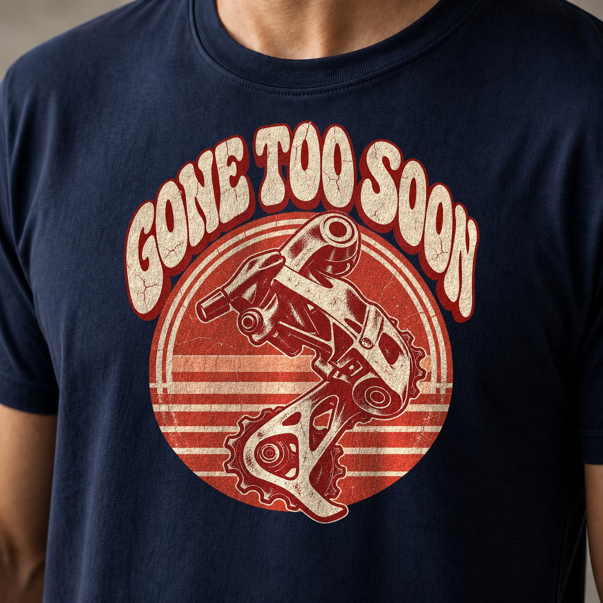 Gone Too Soon funny mountain bike t-shirt in Navy — retro seventies sunset circle with a rear derailleur and Gone Too Soon lettering — close-up of the print