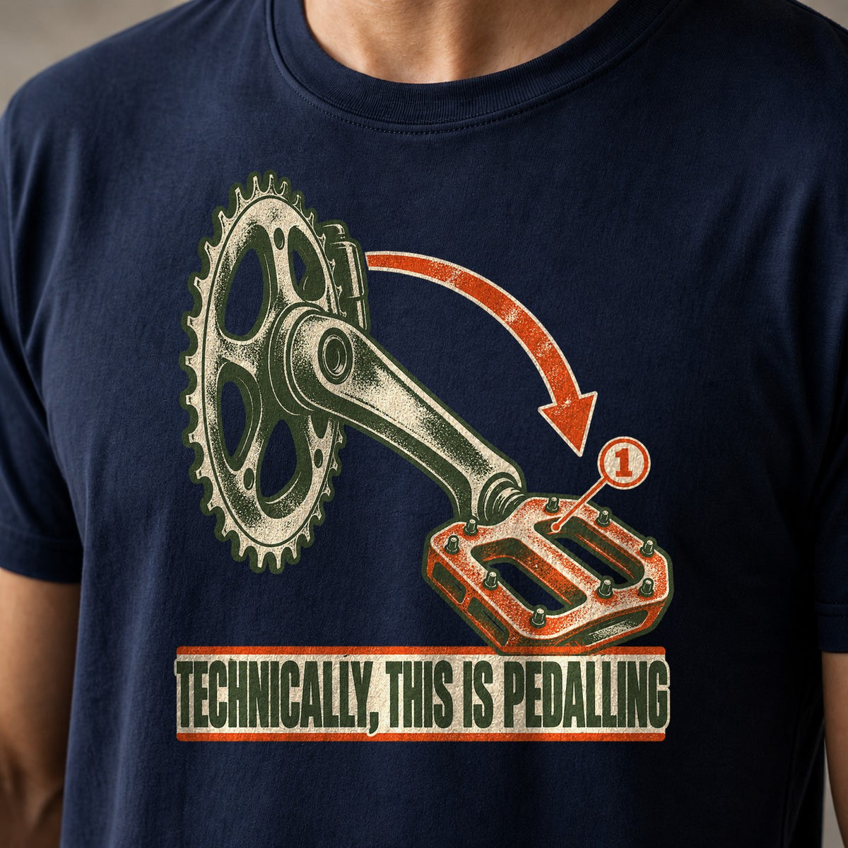 Technically, This Is Pedalling funny mountain bike t-shirt in Navy — technical diagram of a crank arm and pedal with an arrow above Technically This Is Pedalling — close-up of the print