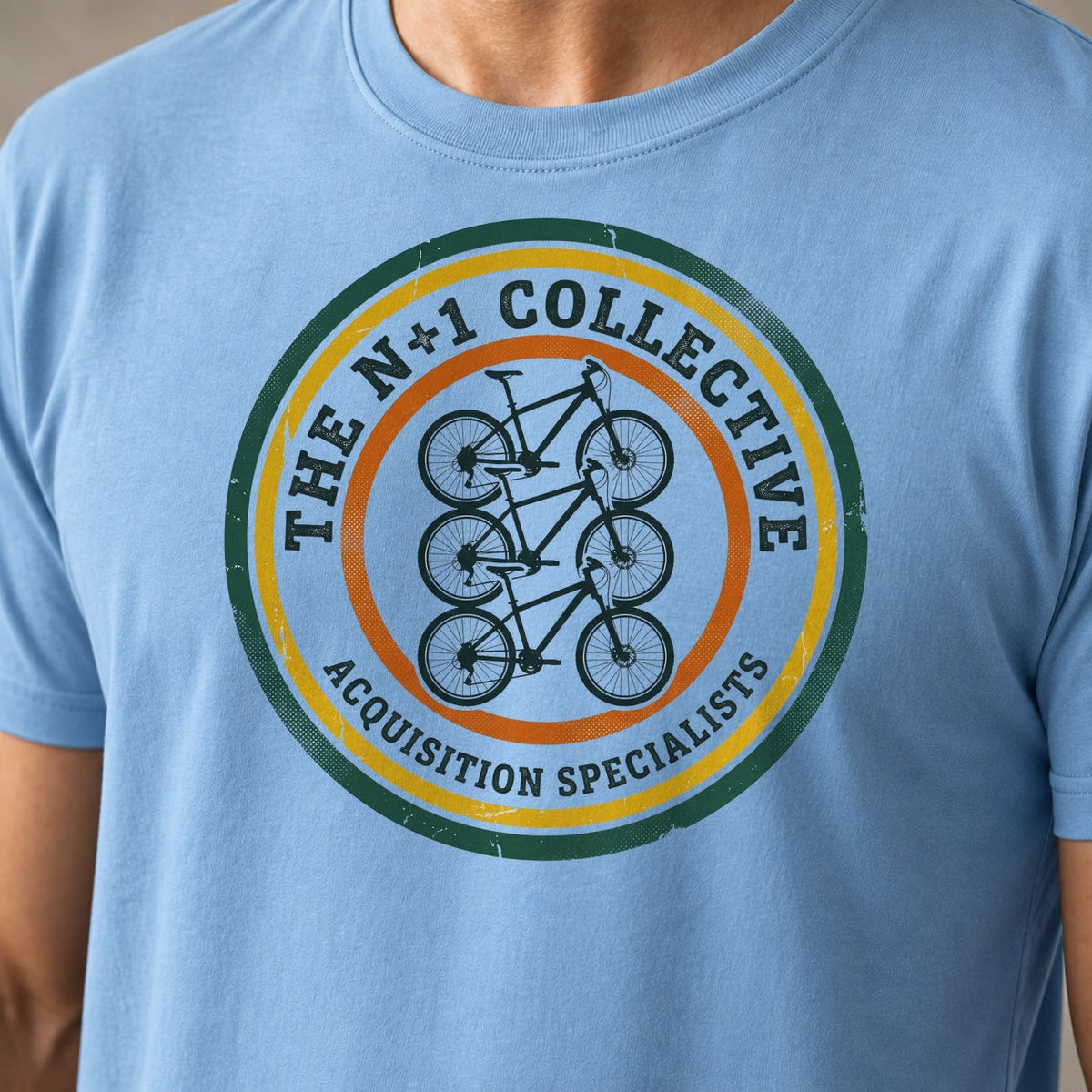 N+1 Acquisition Specialist funny mountain bike t-shirt in Light Blue — close-up of the print