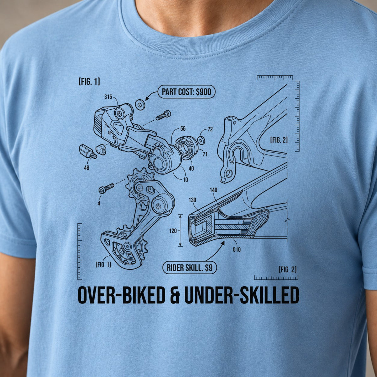 Over-Biked Underskilled funny mountain bike t-shirt in Light Blue — close-up of the print
