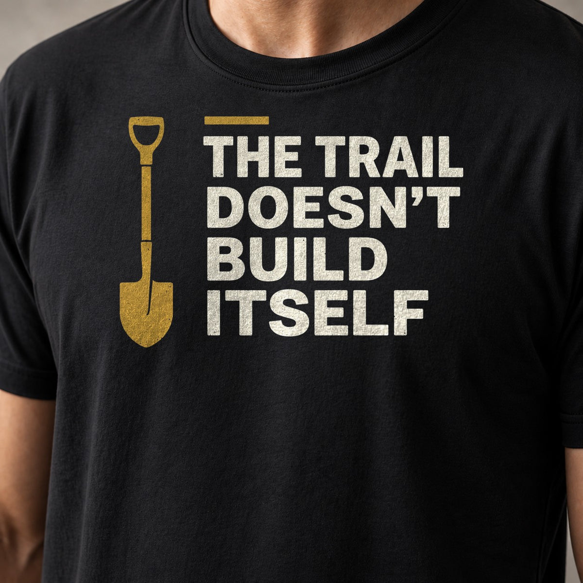 Trail does not build itself funny mountain bike t-shirt in Black — close-up of the print