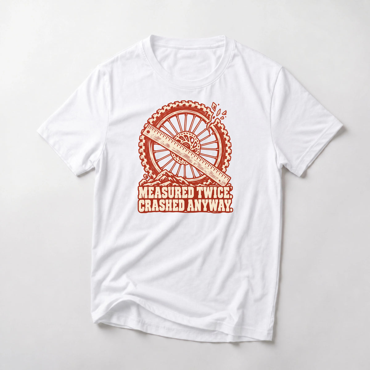 Measured Twice. Crashed Anyway. funny mountain bike t-shirt in White — woodcut wheel and ruler with a cracked rim