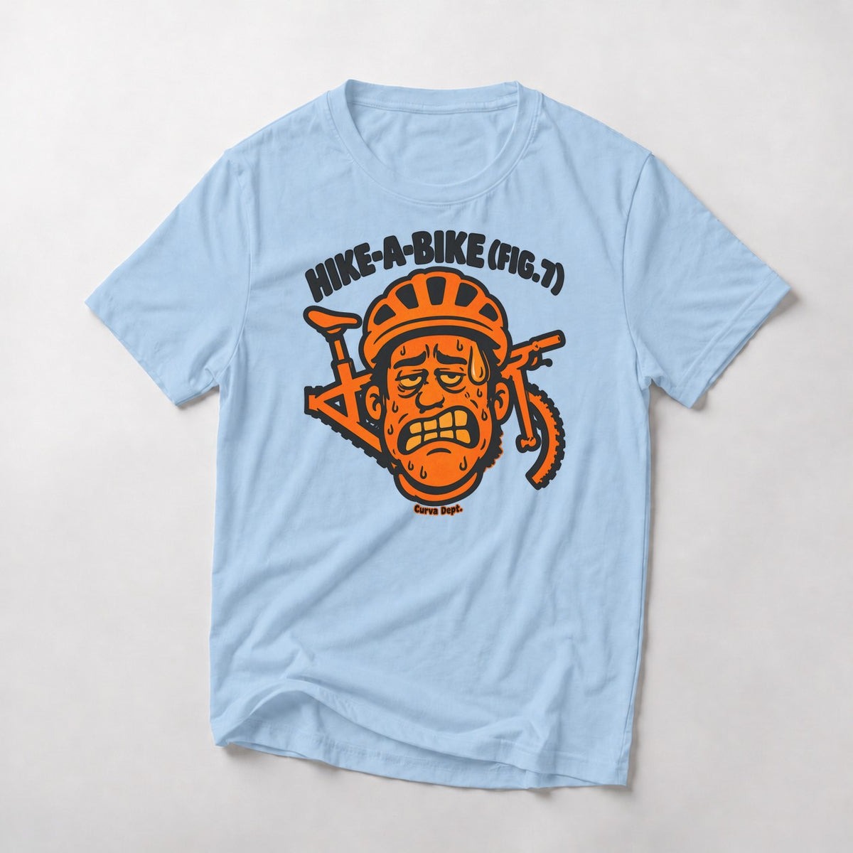 Hike-A-Bike (Fig. 7) mountain bike t-shirt in Light Blue — grimacing cartoon rider in an orange helmet with the bike behind his head