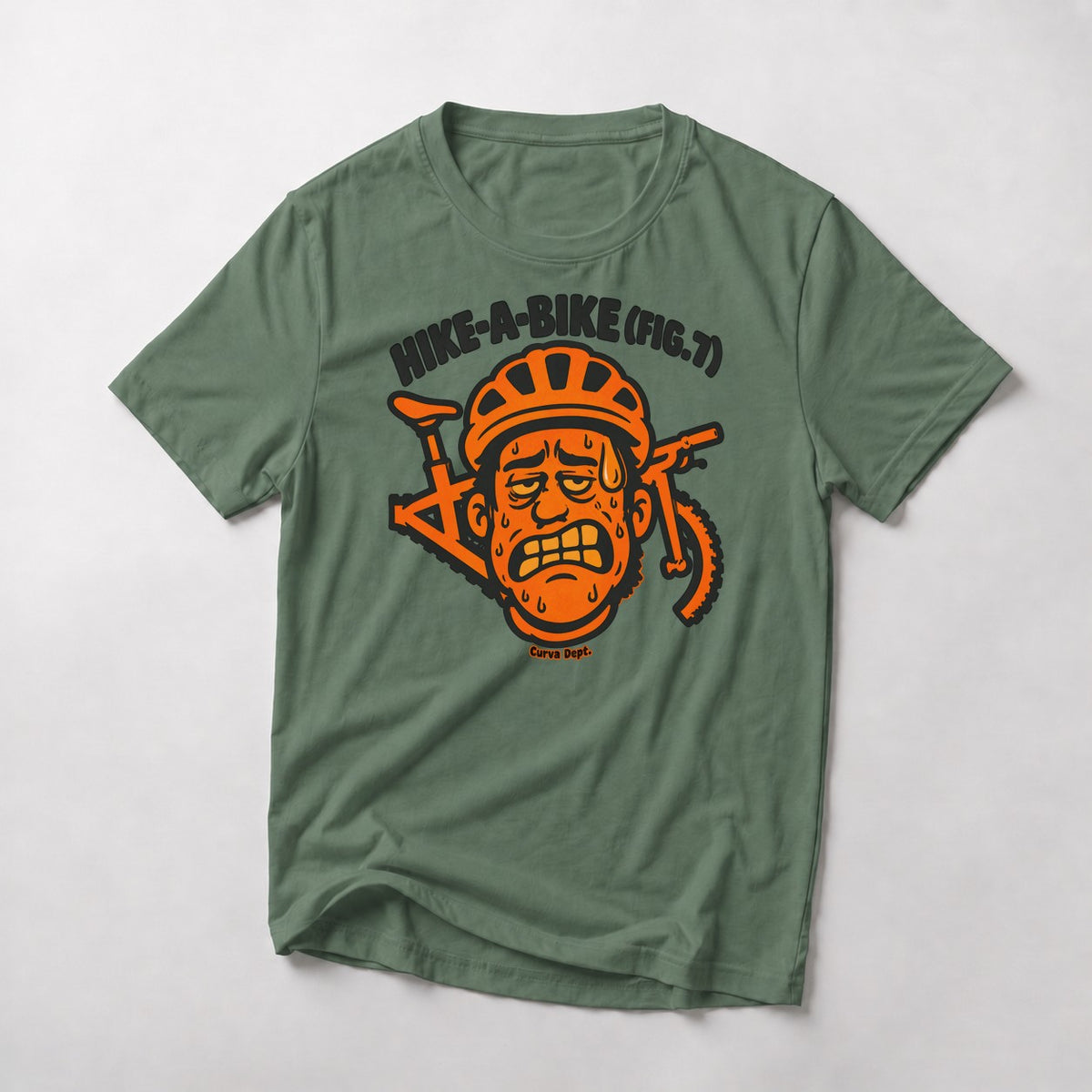 Hike-A-Bike (Fig. 7) mountain bike t-shirt in Military Green — grimacing cartoon rider in an orange helmet with the bike behind his head