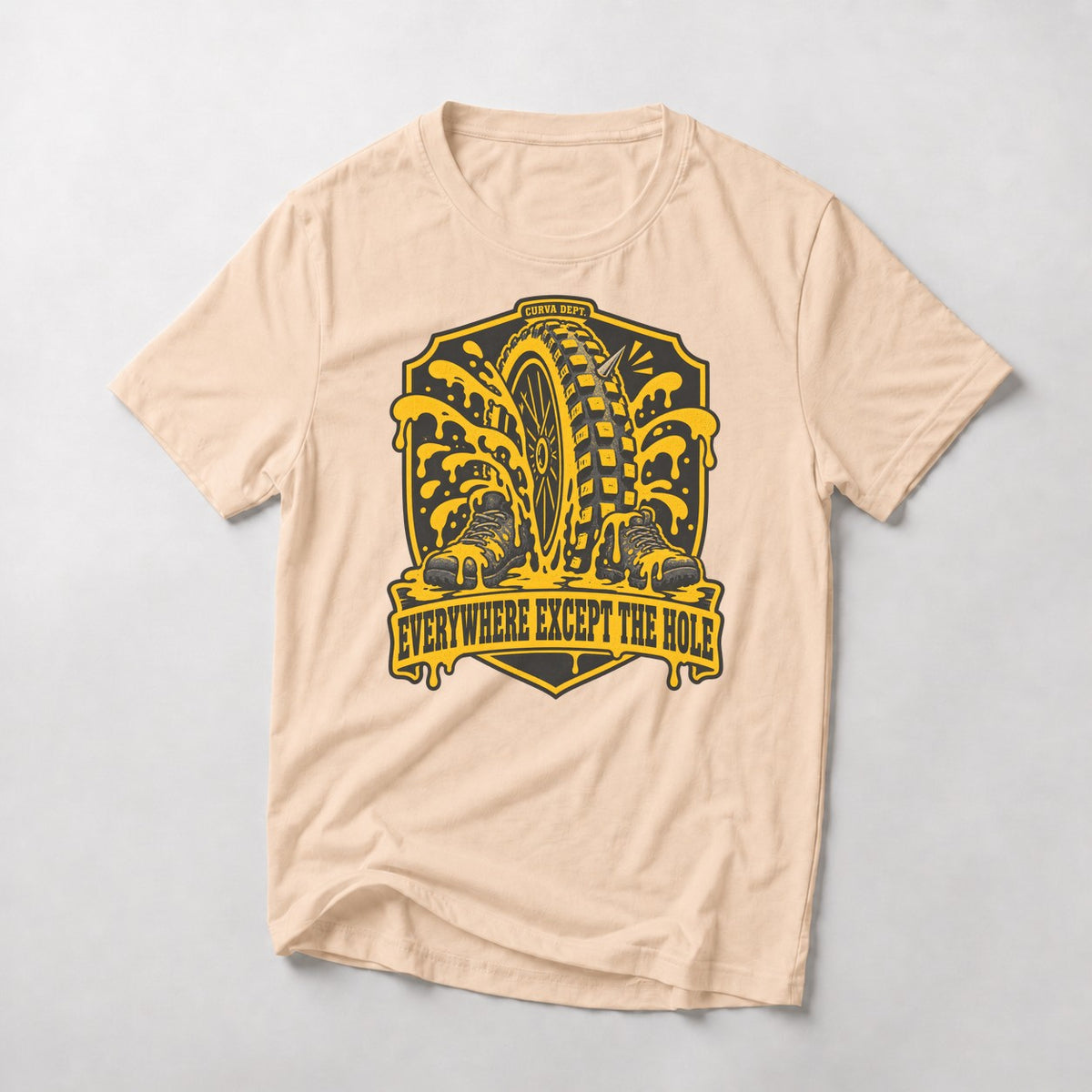Everywhere Except The Hole mountain bike t-shirt in Natural — crest of a punctured tire erupting sealant over two boots