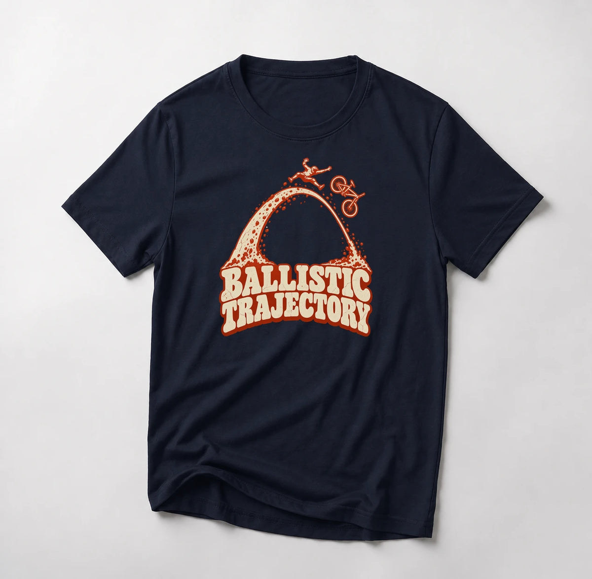 Ballistic Trajectory funny mountain bike t-shirt in Navy — rider separating from his bike at the apex of a big dirt arc above Ballistic Trajectory lettering