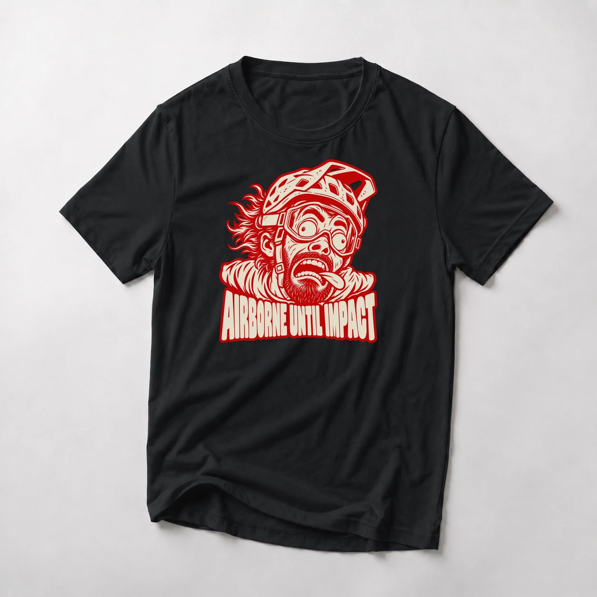 Airborne Until Impact funny mountain bike t-shirt in Black — screaming mountain biker face mid-air with goggles askew above Airborne Until Impact text