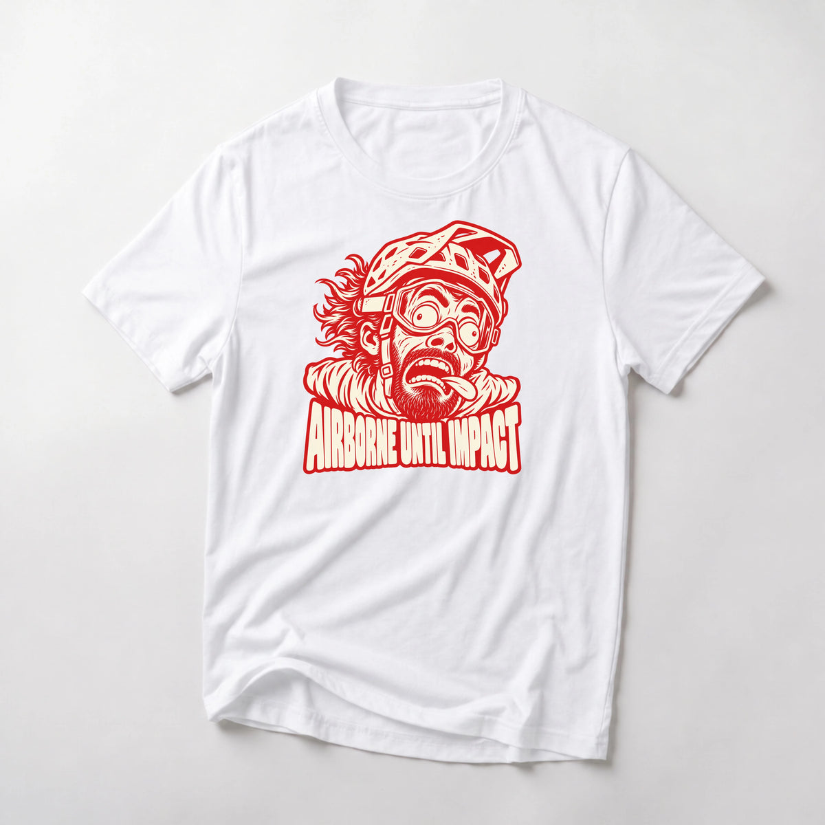 Airborne Until Impact funny mountain bike t-shirt in White — screaming mountain biker face mid-air with goggles askew above Airborne Until Impact text
