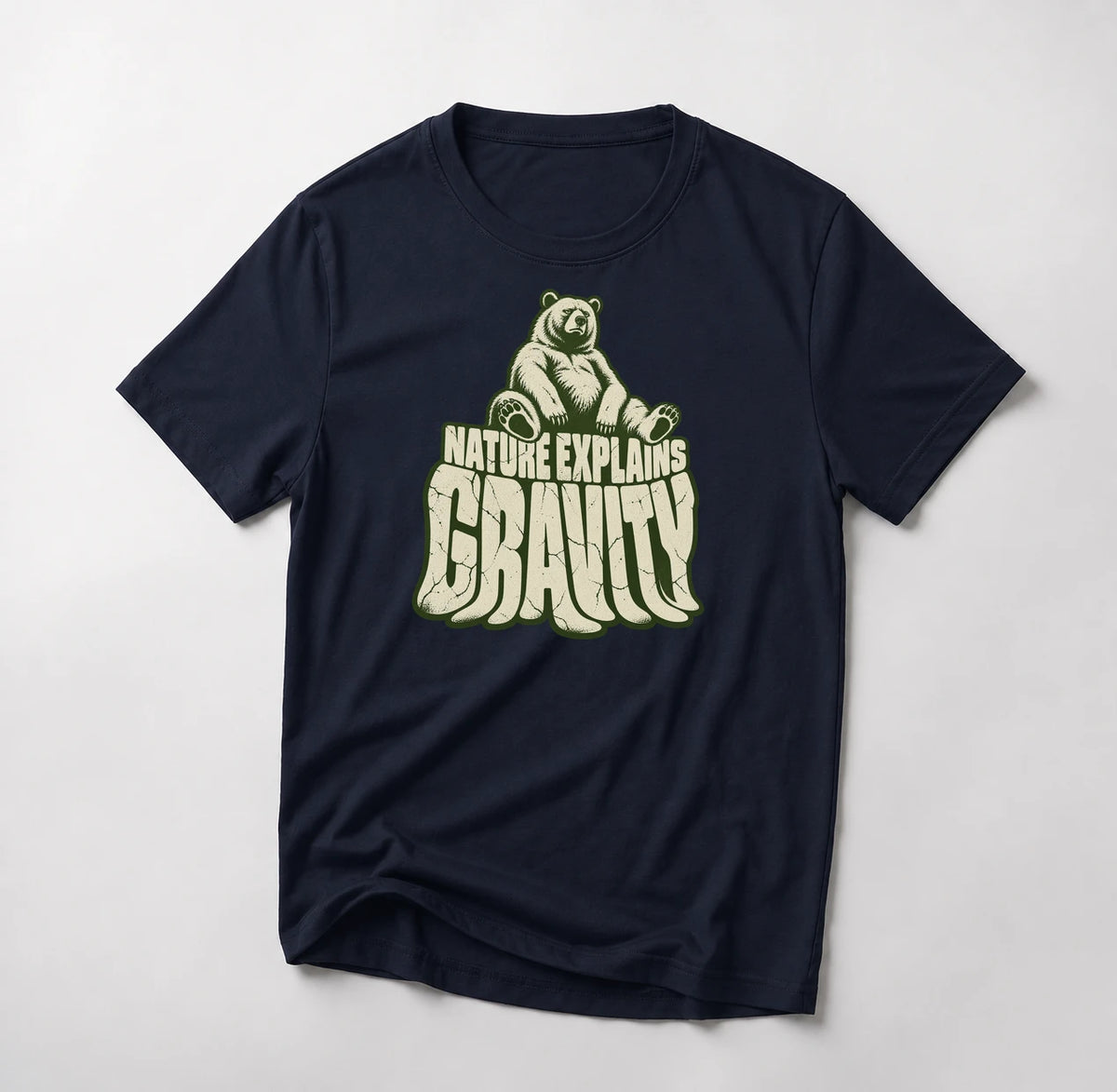 Nature Explains Gravity funny mountain bike t-shirt in Navy — bear sitting on top of sagging Gravity letters under Nature Explains text