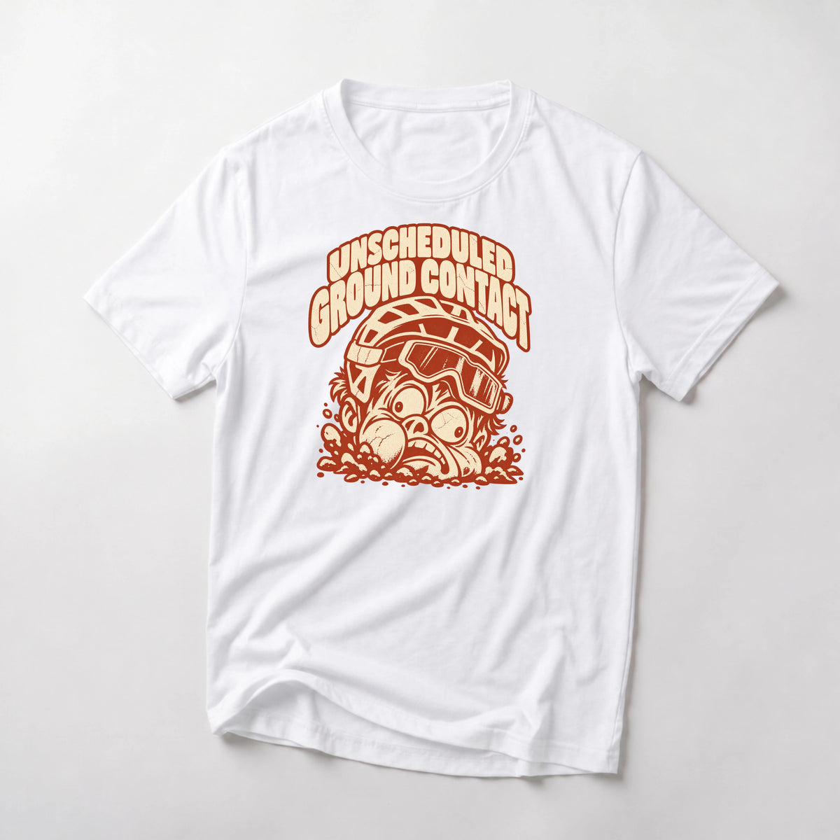 Unscheduled Ground Contact funny mountain bike t-shirt in White — mountain biker face planted in the dirt with goggles under Unscheduled Ground Contact