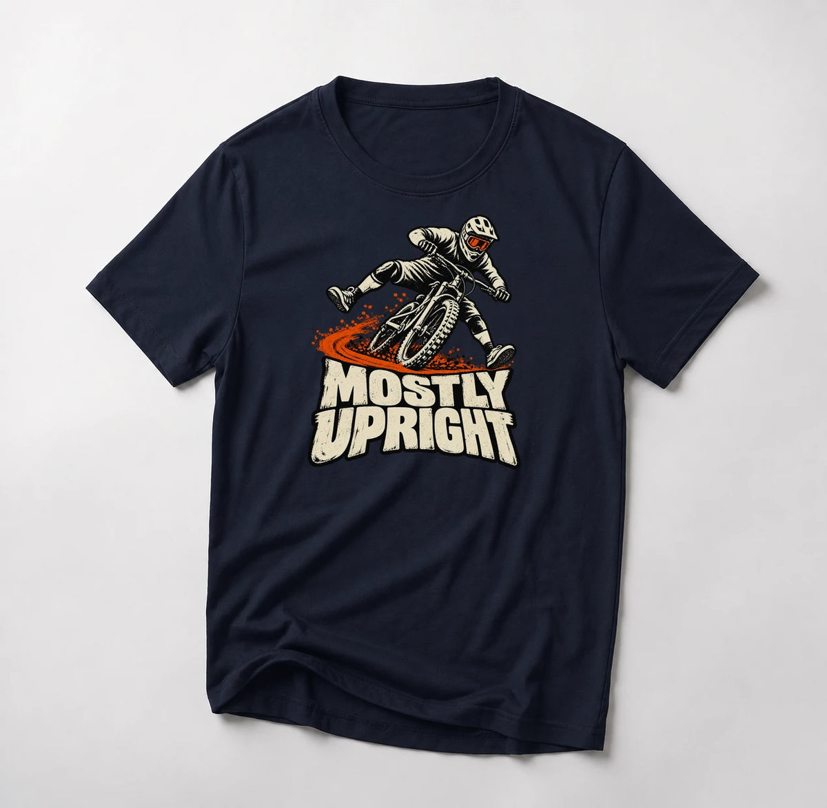 Mostly Upright funny mountain bike t-shirt in Navy — mountain biker leaning mid-save with front wheel washing out above Mostly Upright