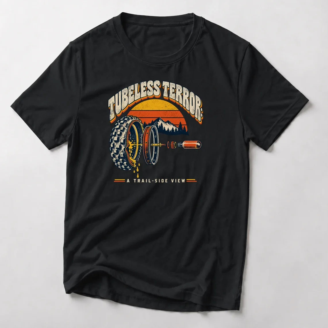 Tubeless Terror A Trail-Side View retro mountain bike t-shirt in Black — 70s sunset over mountains with an exploded view of a leaking tubeless tire, rim and valve