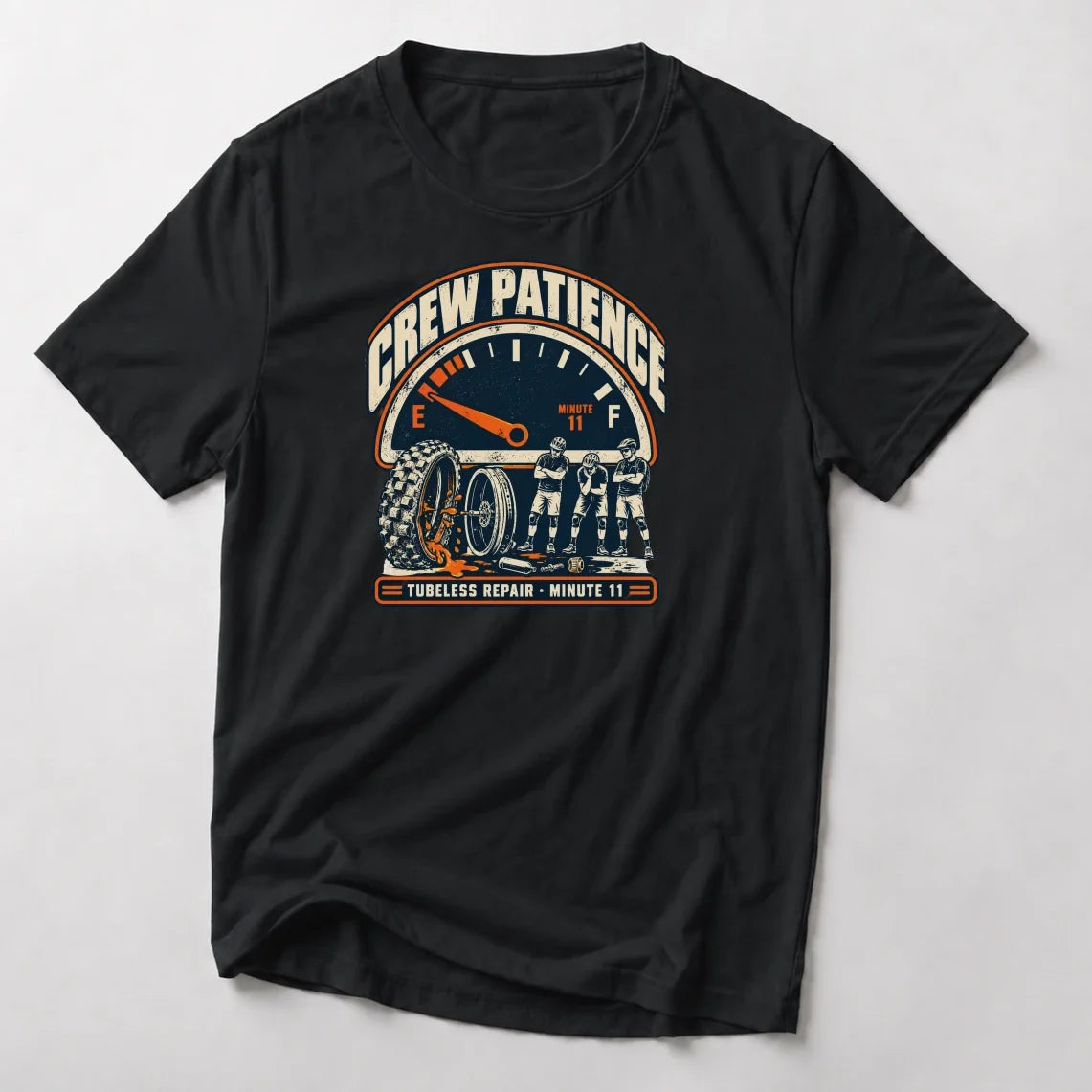 Crew Patience funny mountain bike t-shirt in Black — fuel gauge on empty above a leaking tire and three riders waiting with arms crossed, Tubeless Repair Minute 11