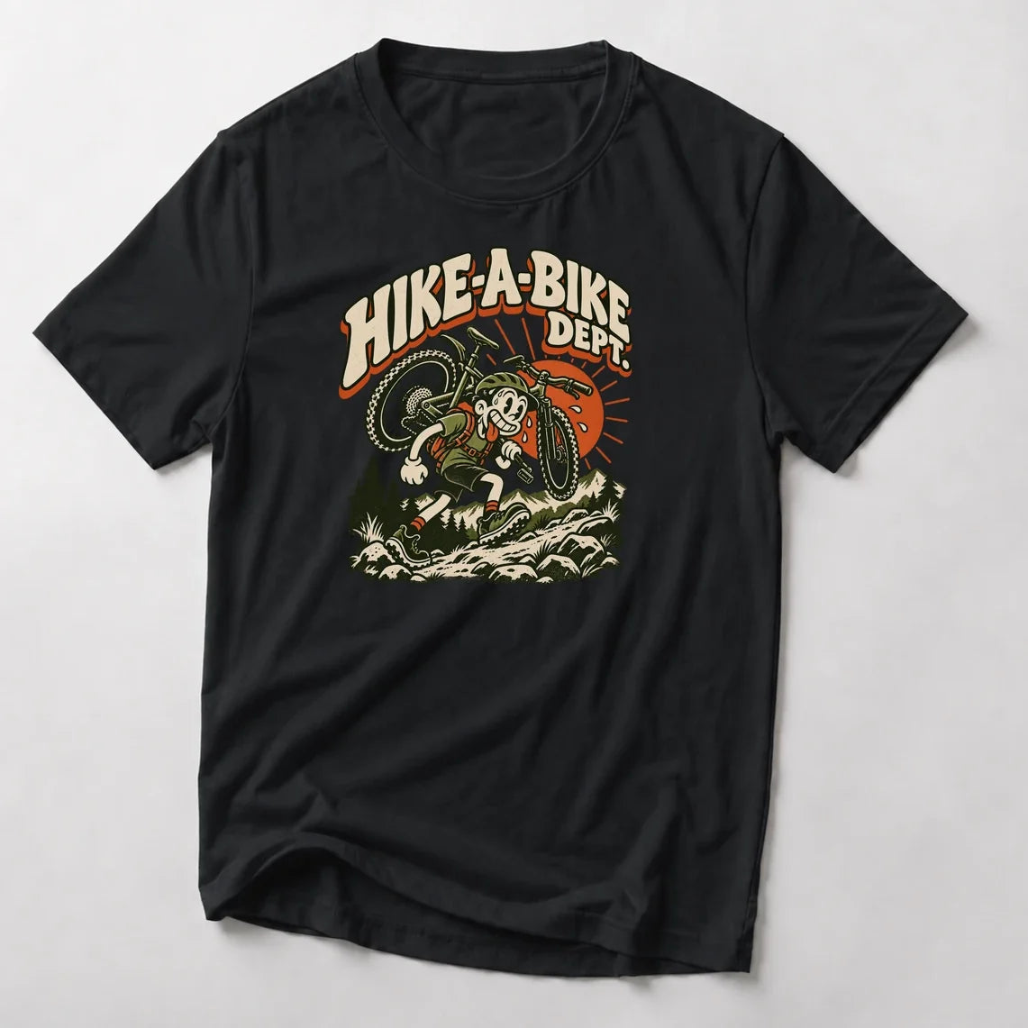 Hike-A-Bike Dept. retro cartoon mountain bike t-shirt in Black — rubber-hose rider carrying a bike on the shoulders up a rocky trail under an orange sun